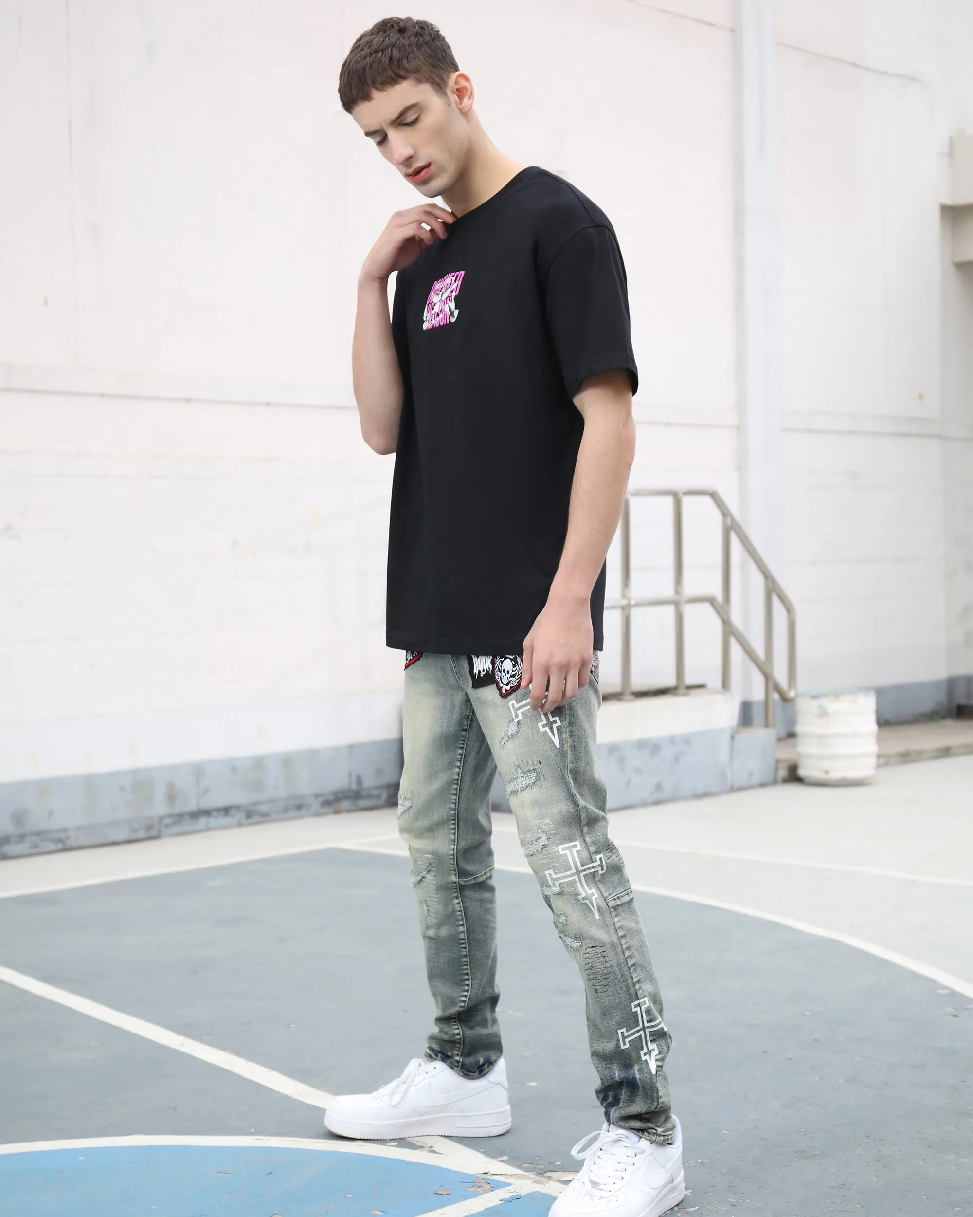 Blue Straight Leg Ripped Jeans with Graphic Print and Personalized Skull Emblem